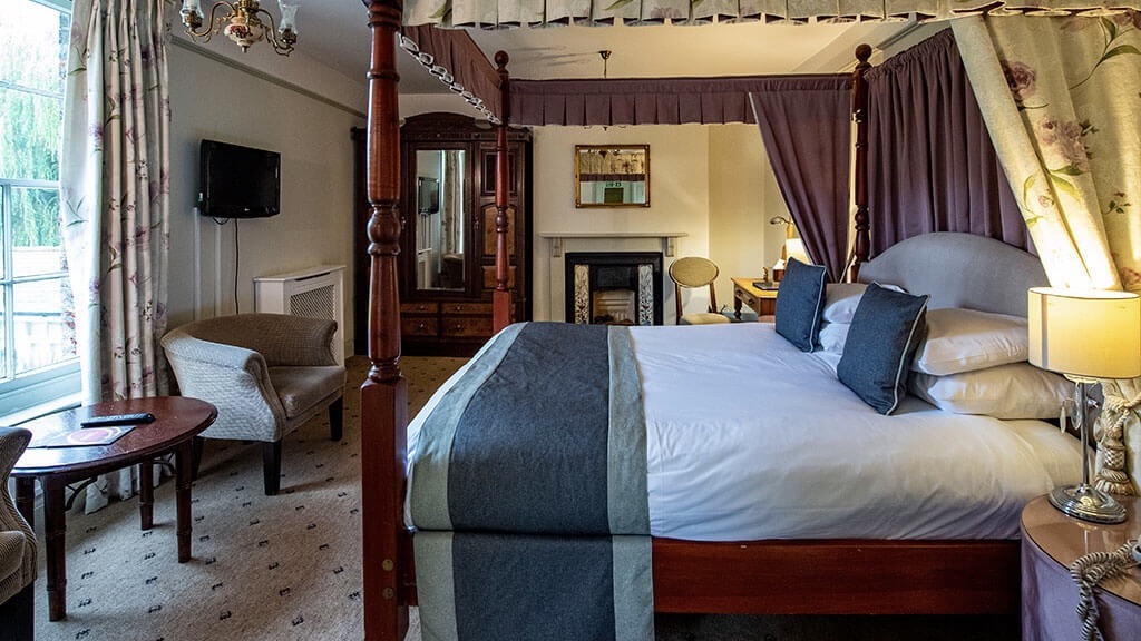 Quy Mill Hotel & Spa four poster bedroom at one of the best luxury hotels in Cambridge