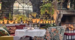 The-Ivy-Chelsea-Garden-Winter-Terrace-With table and fireplace at one of the best Posh restaurants in Chelsea Paul Winch-Furness - Photographer
