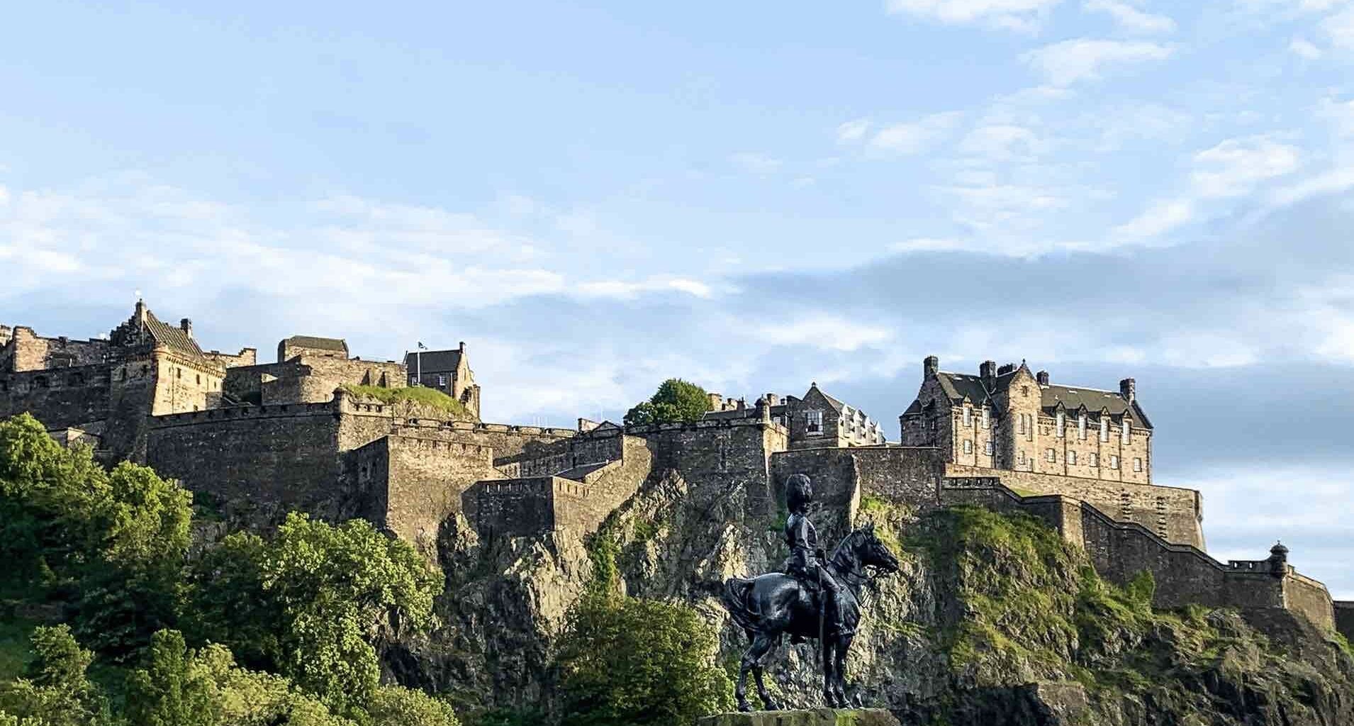 View of Edinburgh Castle the history of Edinburgh Castle Scotland kate-bielinski-unsplash