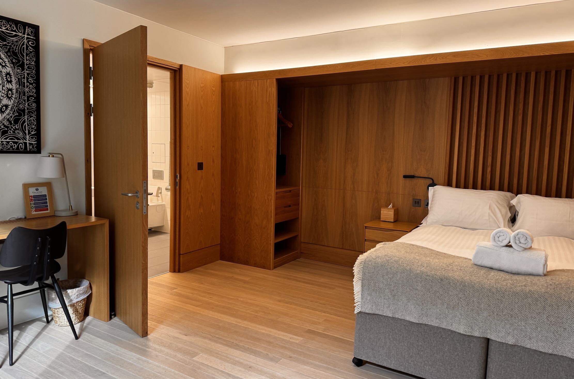 Warm and Woody bedrooms at Rhodes House photo by Bryan Dearsley