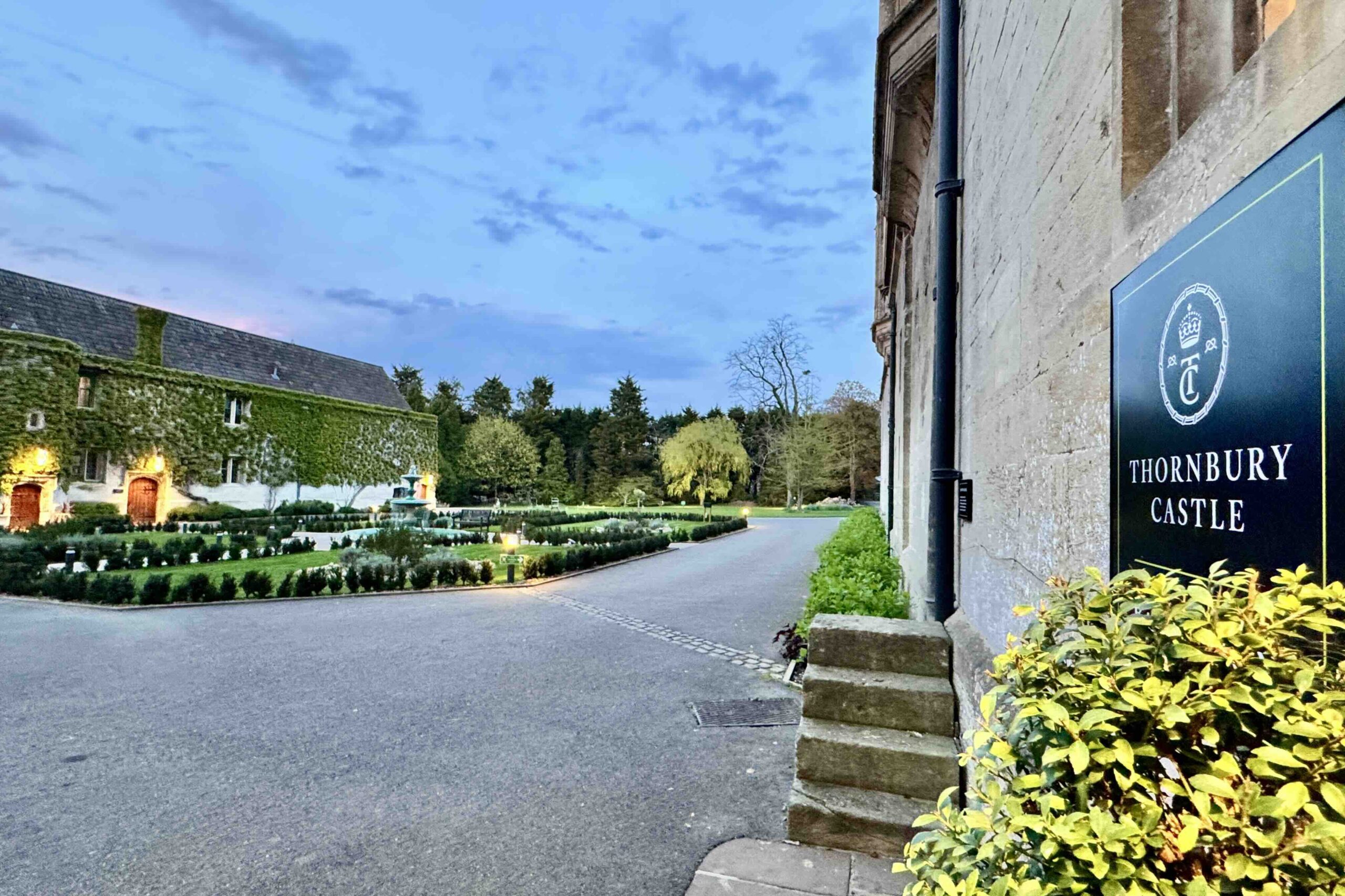 Thornbury Castle sign and courtyard at dusk photo by Bryan Dearsley