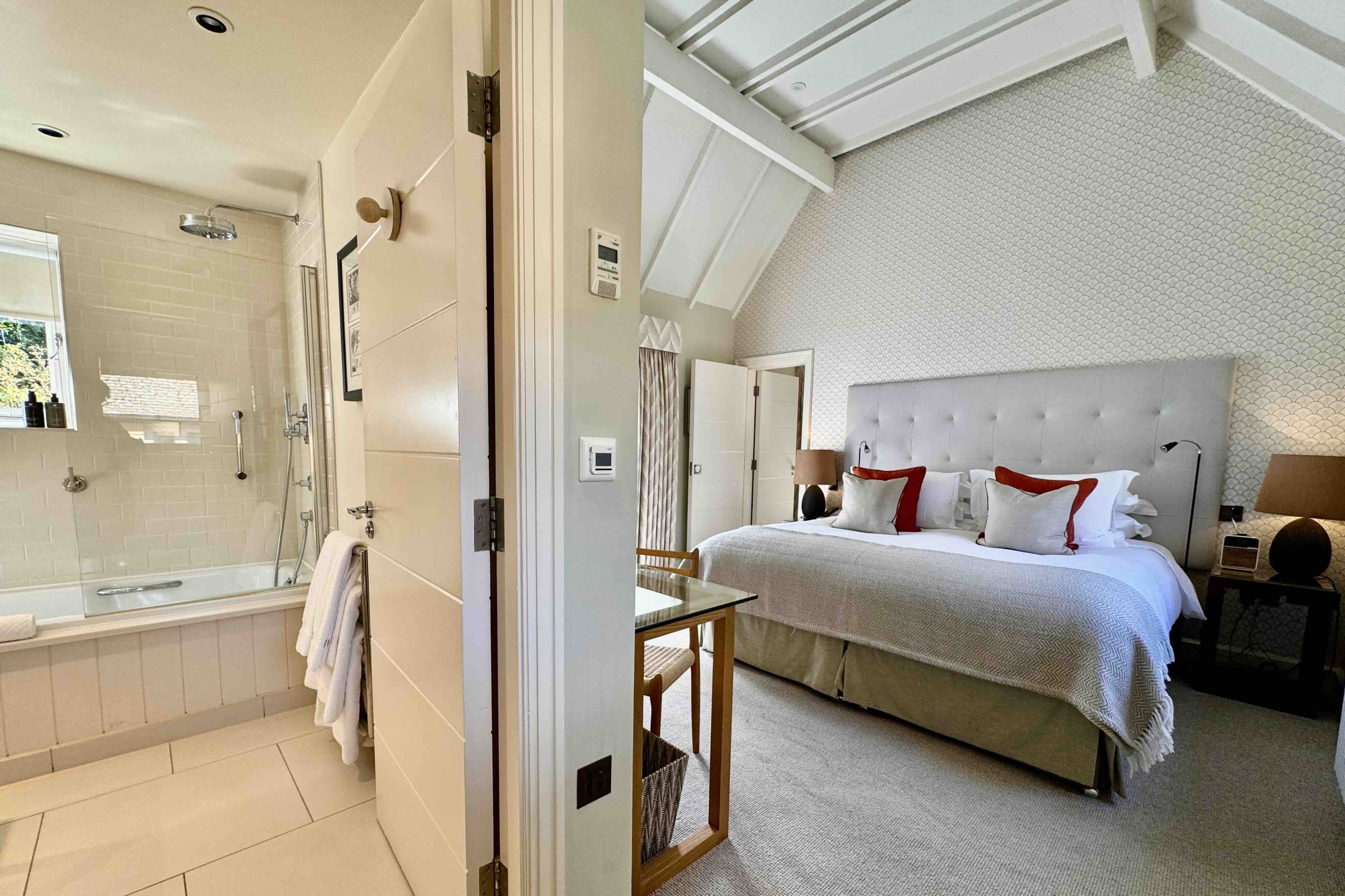 Hot Tub Courtyard Suite bedroom and bathrom photo by Bryan Dearsley